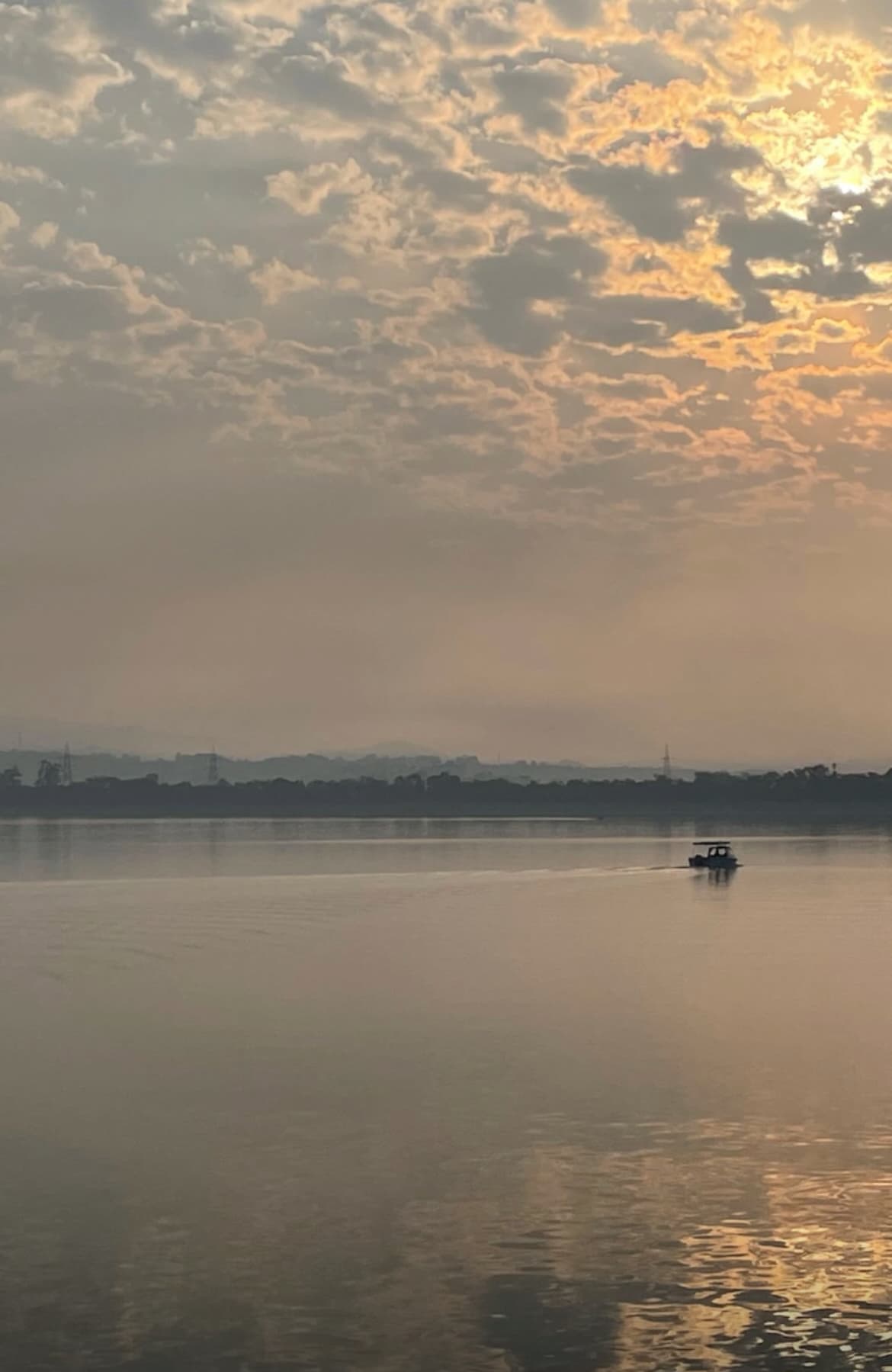 Sunrise reflection over a calm lake